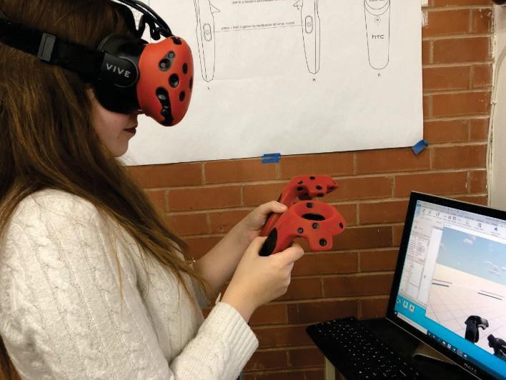 Boulgamh conducting research using VR goggles
