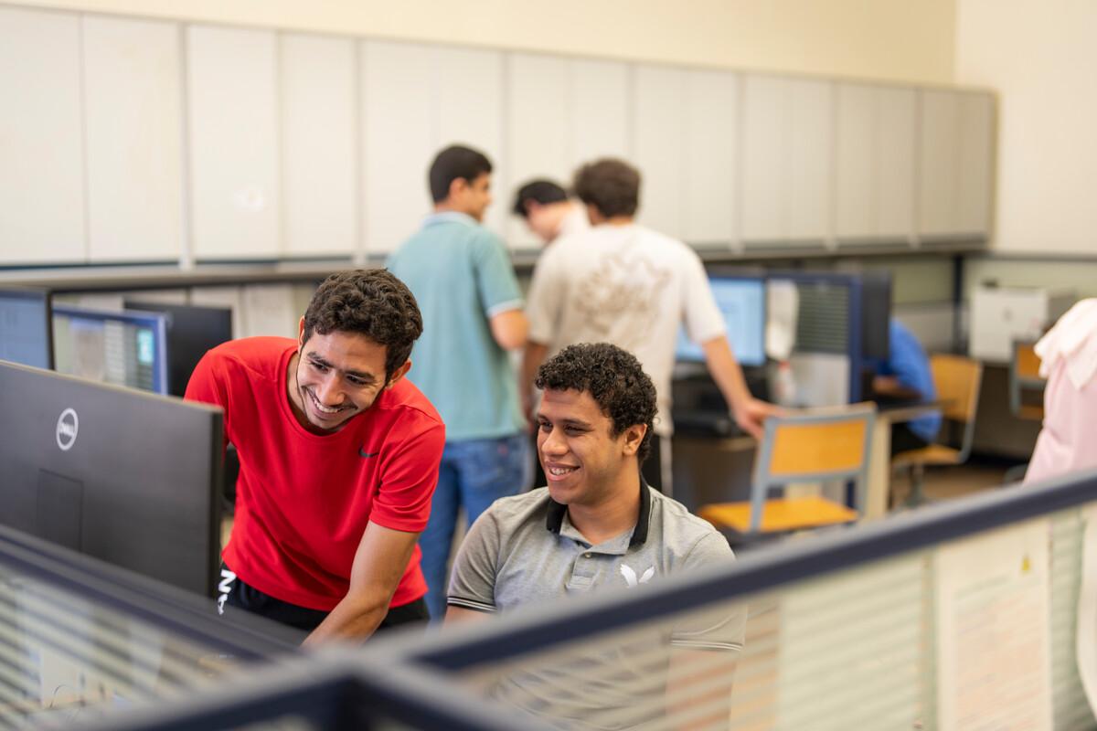 students in computer lab working on project