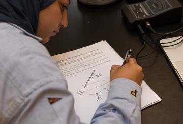Student solving a physics problem