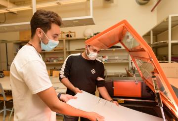 student working in electronics lab