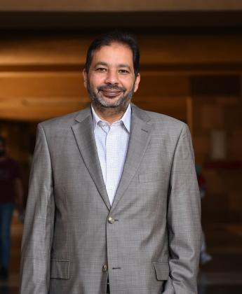 Man with suit smiling