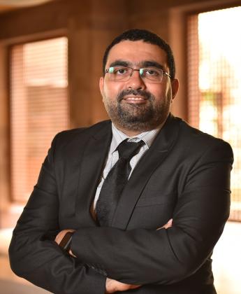 Man with suit smiling