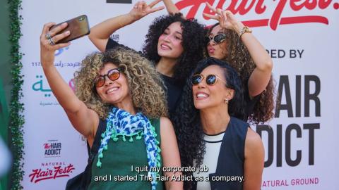 Four women taking a selfie and smiling