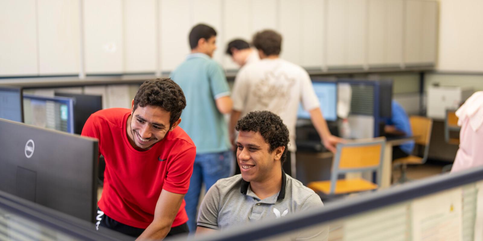 students in computer lab working on project