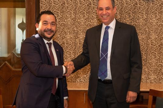 AUC Provost Ehab Abdel-Rahman and Dow Egypt's Country Manager Momen Adel sign the AUC-Dow research and development partnership