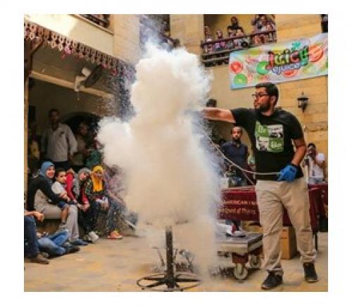 A man experimenting with smoke in a funlab show