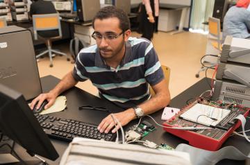 student working in digital lab