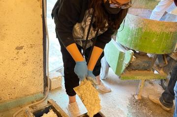 Student making glowing concrete 
