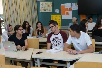 students working together in classroom on project
